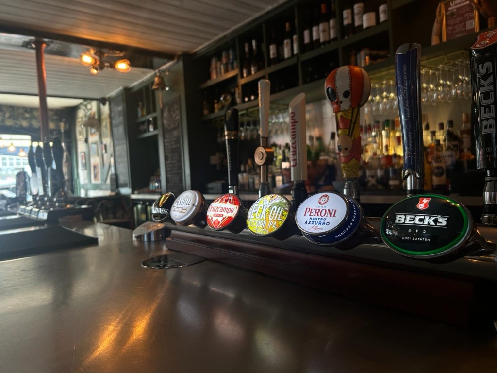 A selection of beer and fine ale pumps.