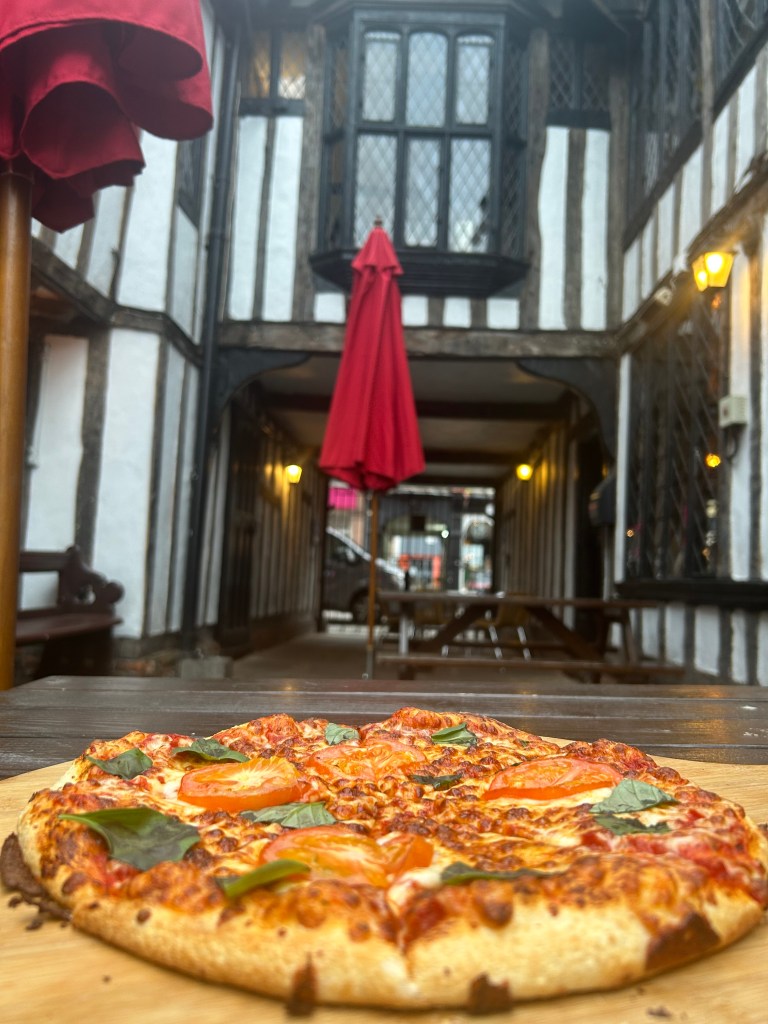 a large oversized on a table in the courtyard